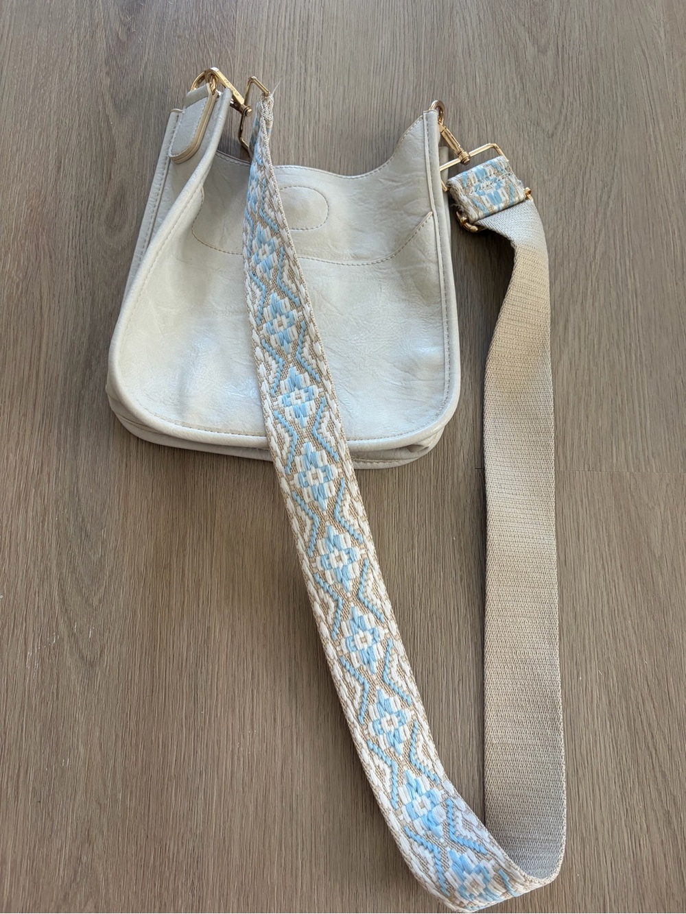 Ah Dorned Cream Crossbody Bag with Patterned Strap